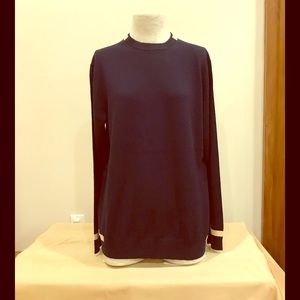 Tretorn navy blue long sleeve sweater. Size M